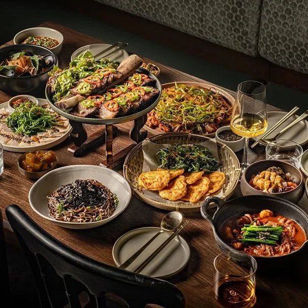 Traditional Korean dishes and shared plates served family-style at Hojokban LA, featuring grilled meats and house specialties