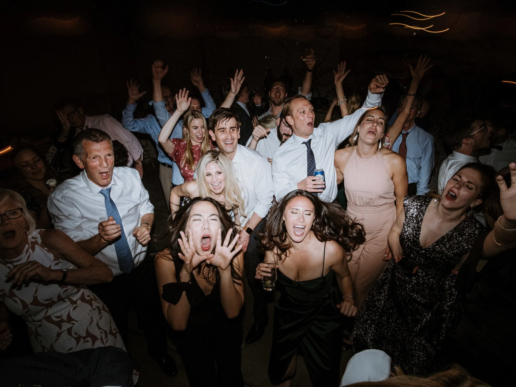 Guests dancing at a destination wedding in Mexico with Mod Society DJ entertainment