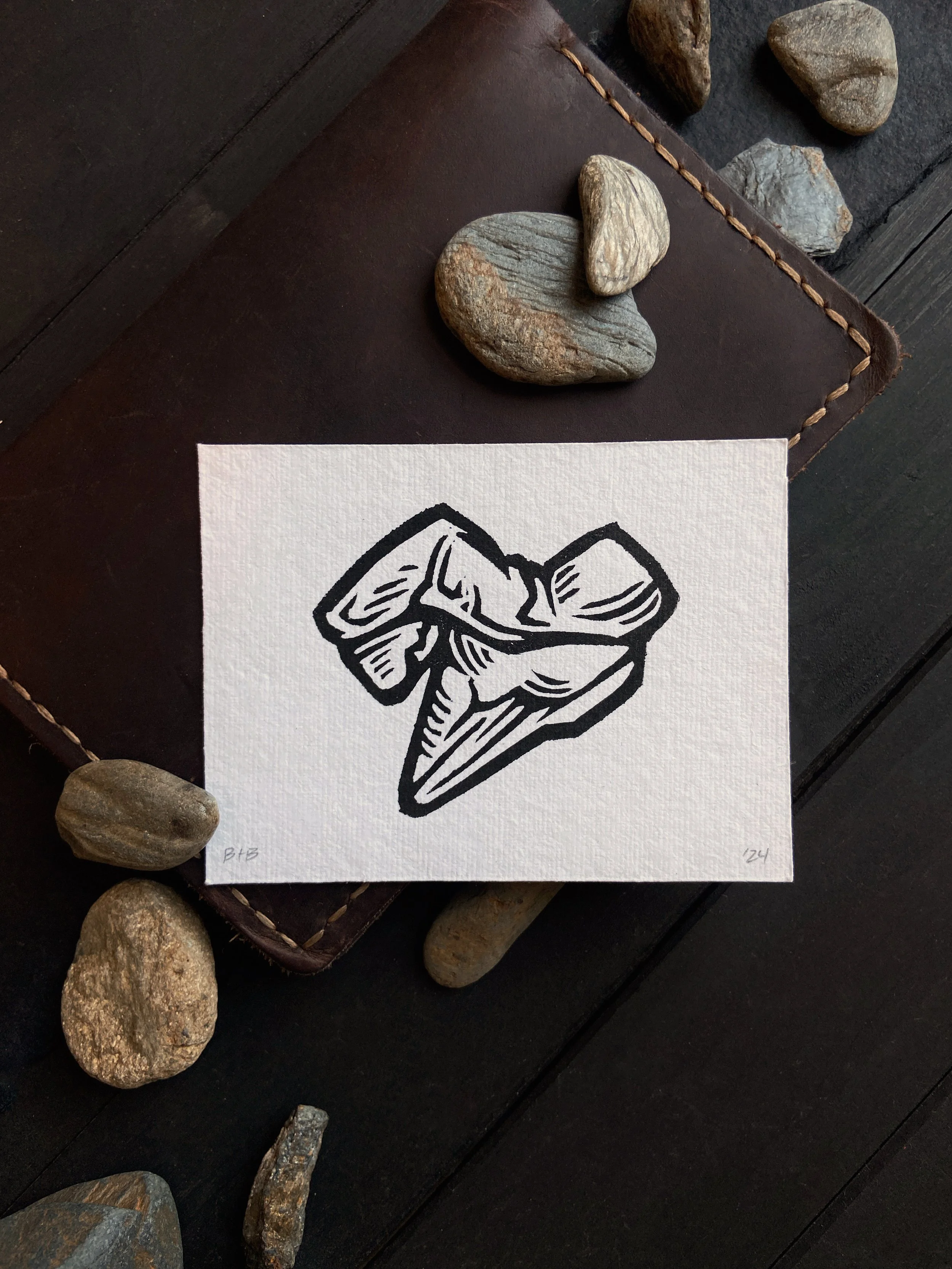 ACS_Direwolf Tooth Linocut Tinyprint Flatlay.JPG