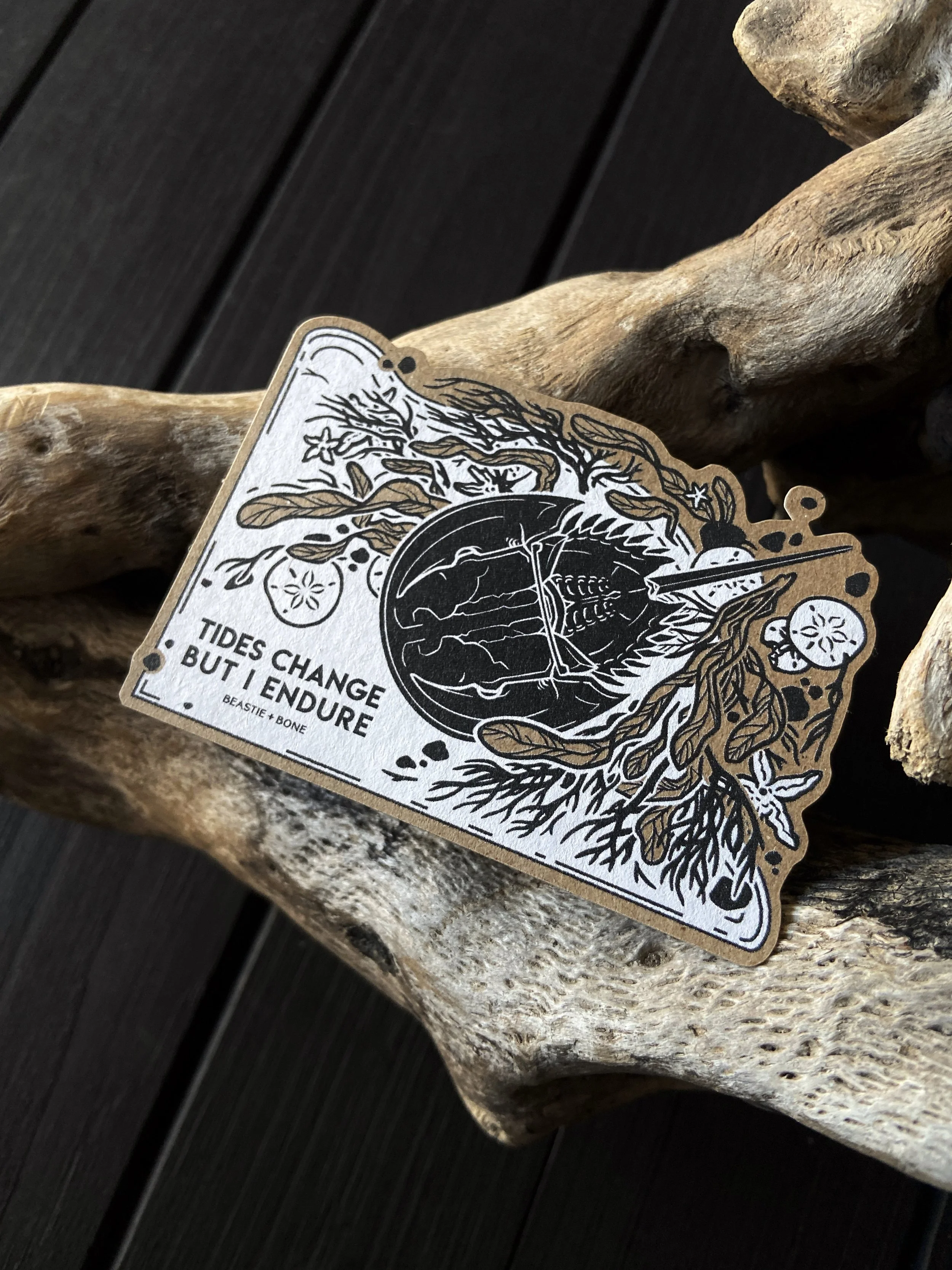 Sunk Deep Sticker Flatlay Angled.jpg
