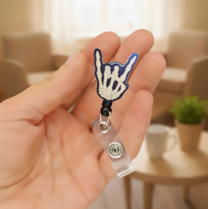 Metal Horns Skeleton Badge Reel Mockup 2.PNG