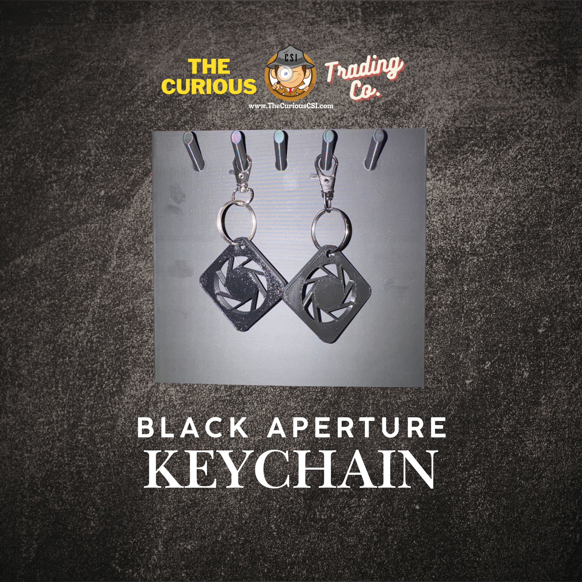 Black Aperture Keychain Mockup 1.png