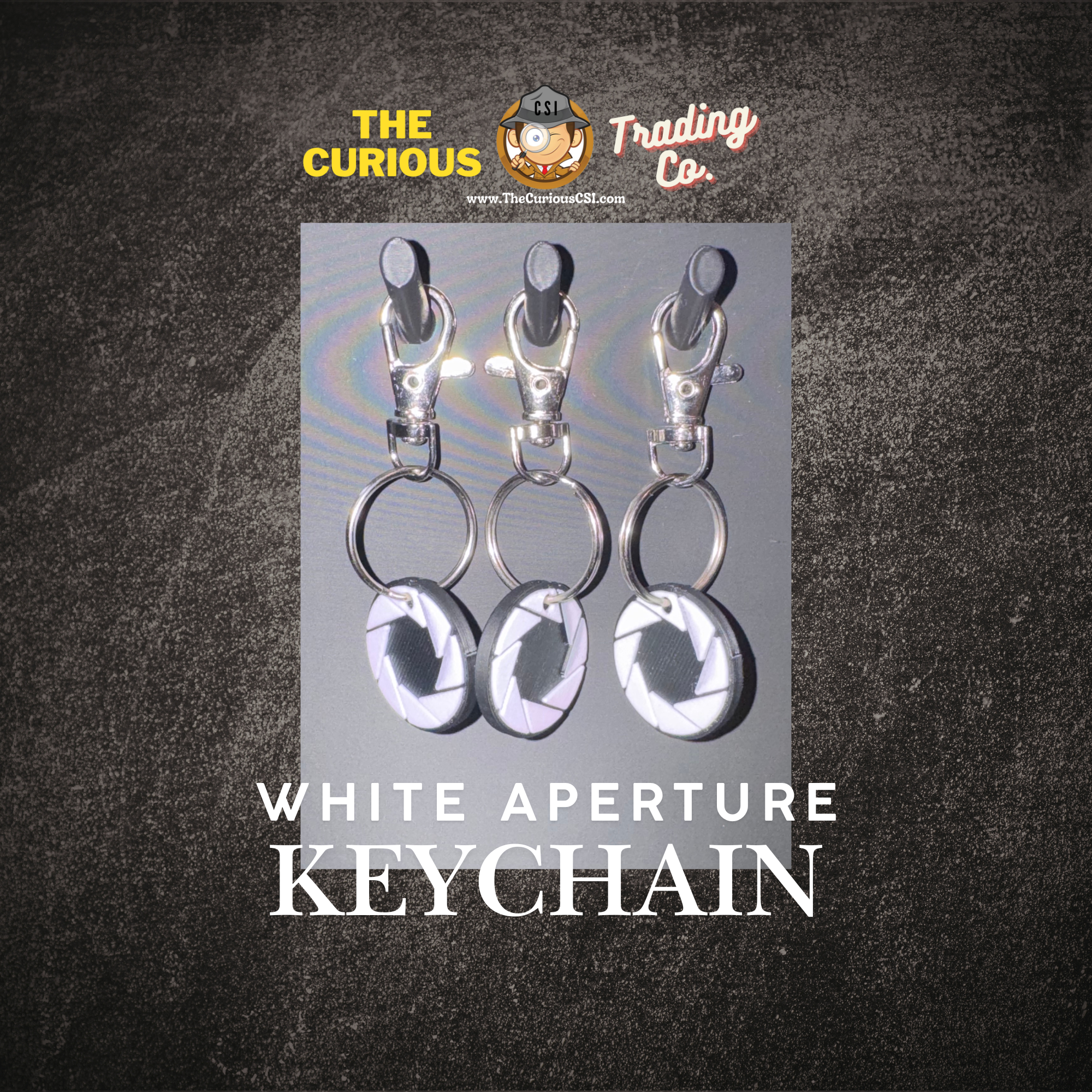 White Aperture Keychain Mockup 1.png