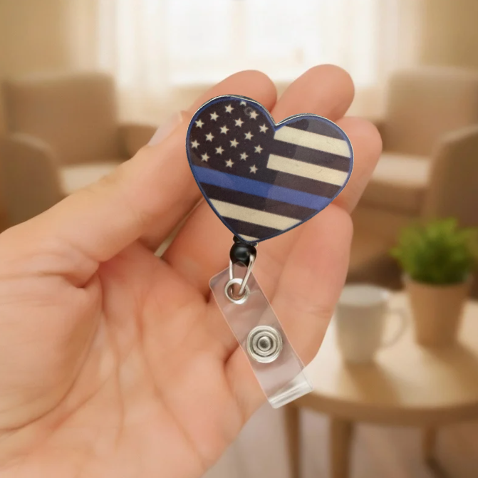 Thin Blue Line Heart Badge Reel Mockup 2.PNG