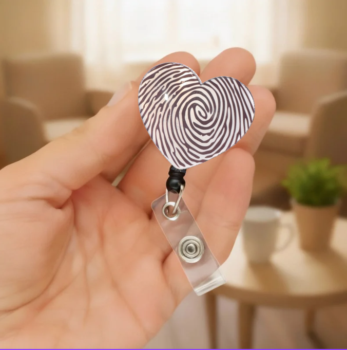 Latent Print Heart Badge Reel Mockup 2.PNG