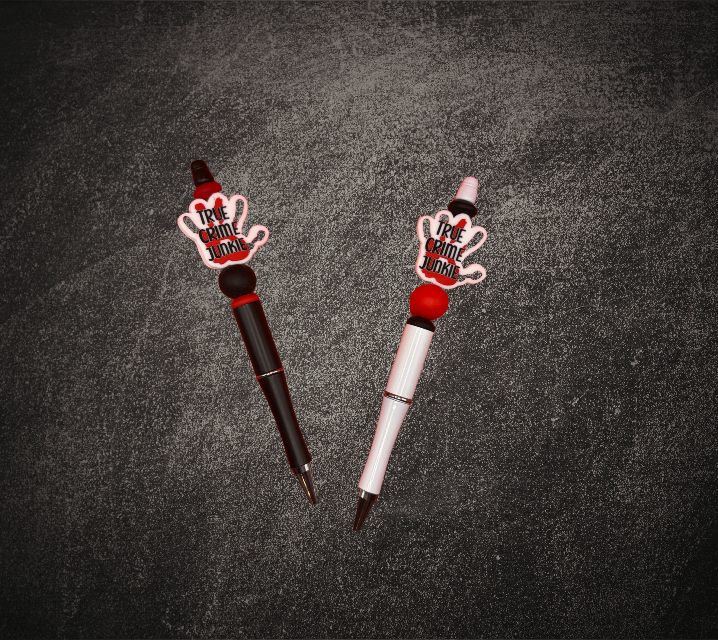 True Crime Junkie Bloody Hand Beaded Pen Mockup.png
