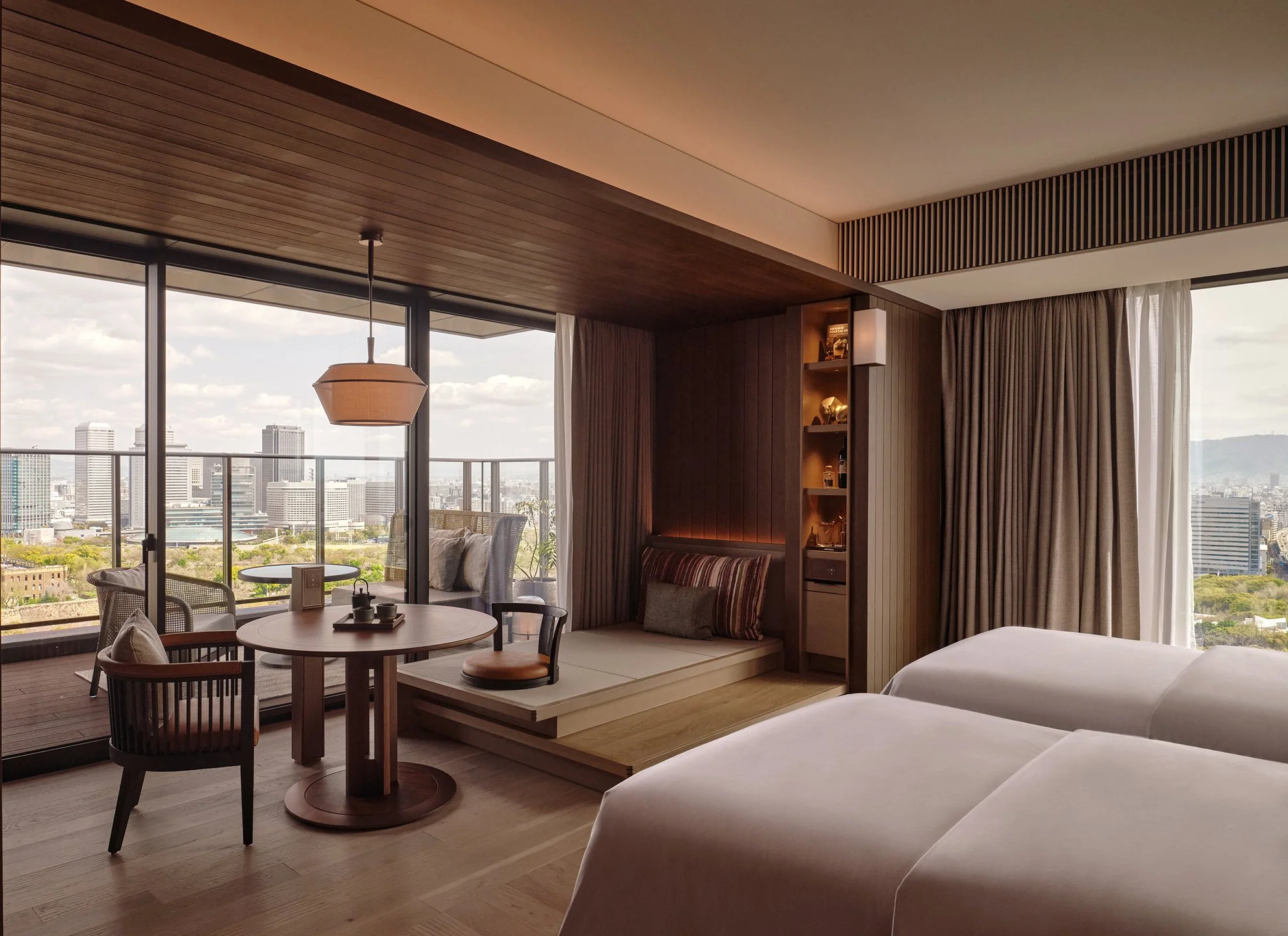18-urban-suite-twin-beds-and-dining-area.jpg