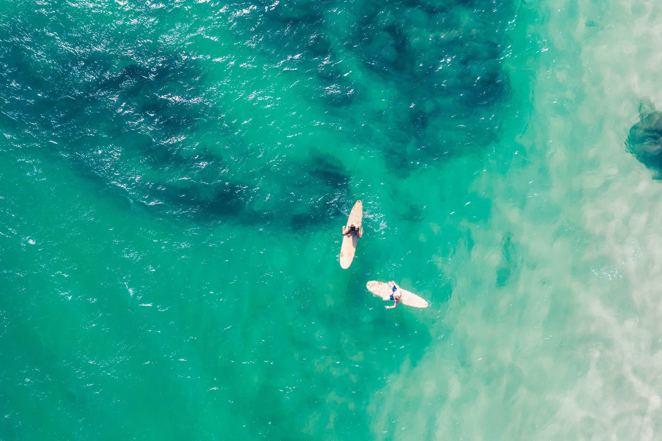 42-paddleboarding-in-clear-coastal-waters.jpg