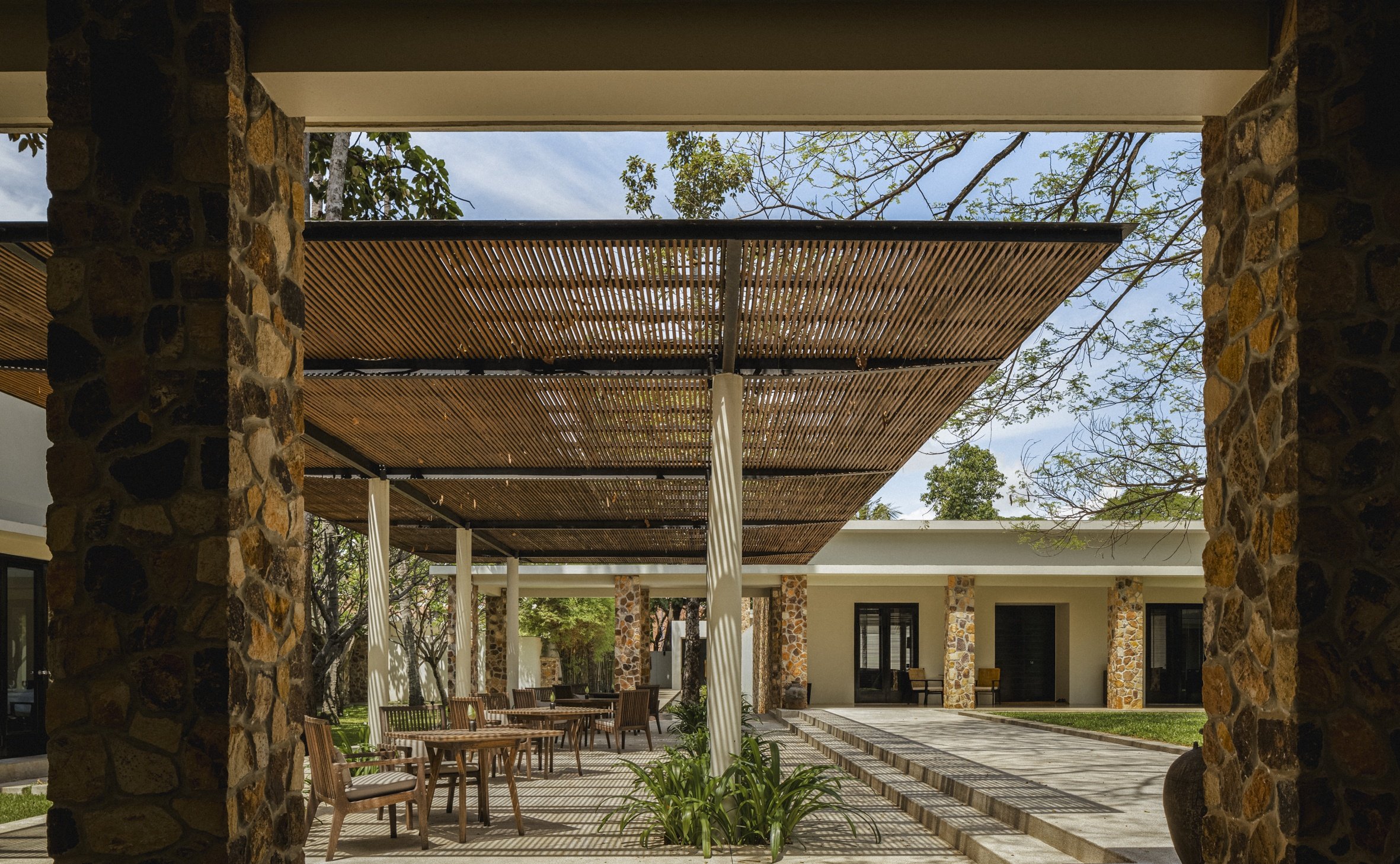 03-stone-columns-and-pergola-at-amansara.jpg