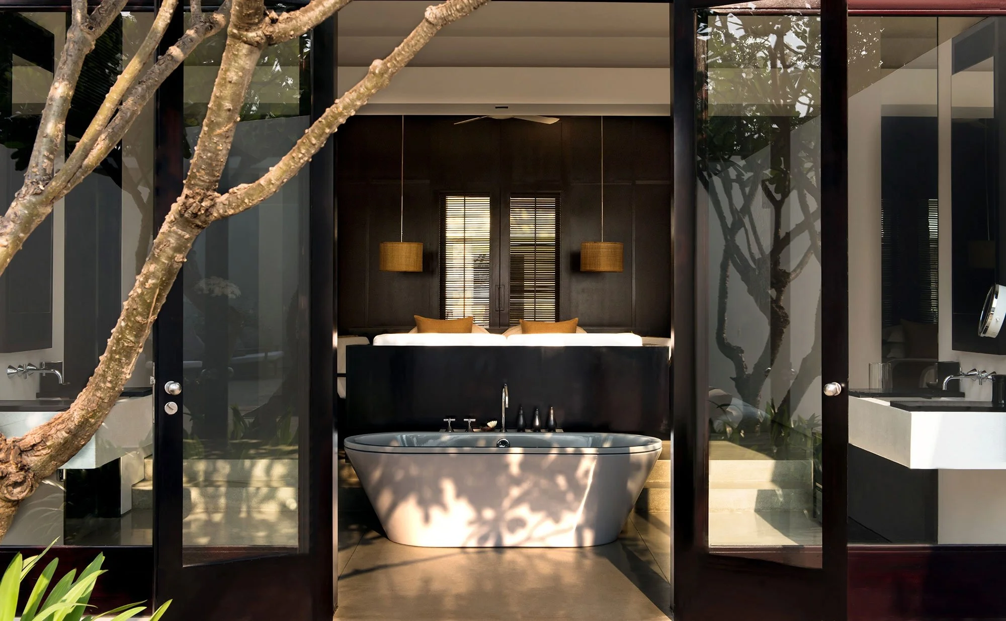 16-pool-suite-living-space-opening-onto-an-outdoor-courtyard.jpg