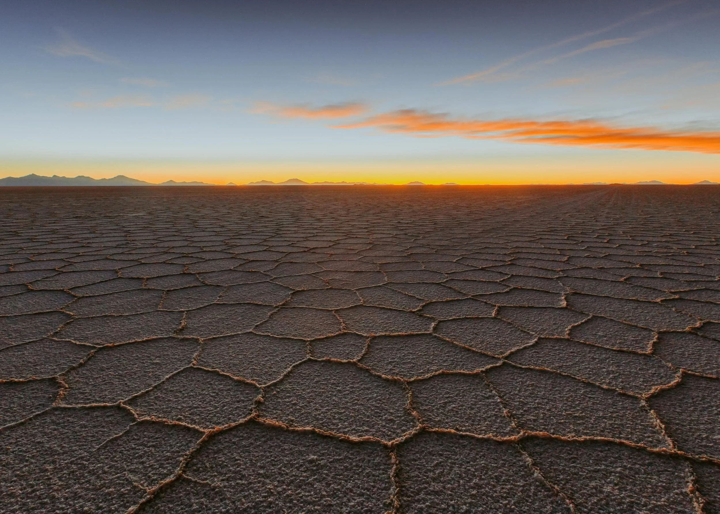 20-polygonal-salt-crust-beneath-an-evening-sky.jpg