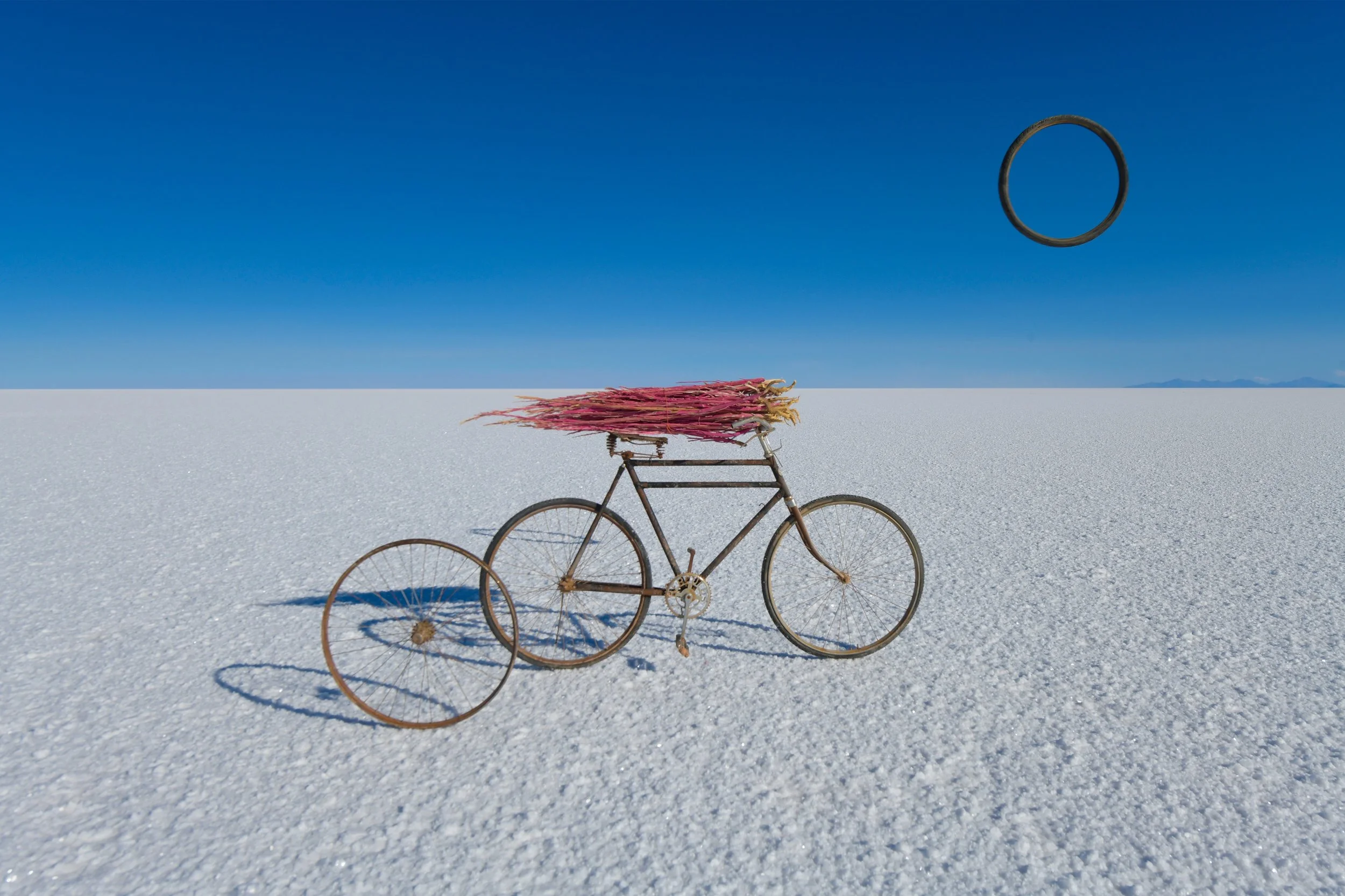 29-bicycle-and-suspended-wheel-in-a-salt-flat-composition.jpg