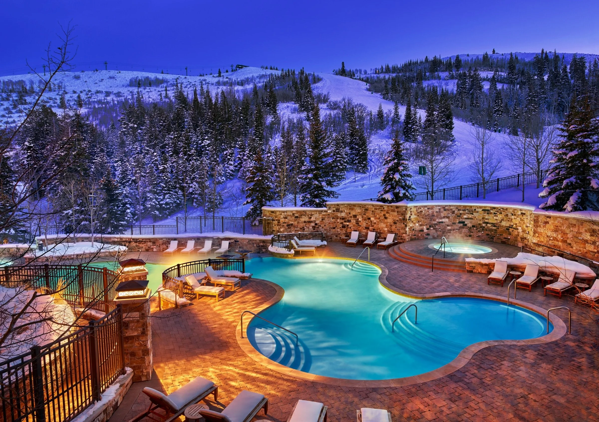 25-outdoor-pool-illuminated-on-a-snowy-evening.jpg