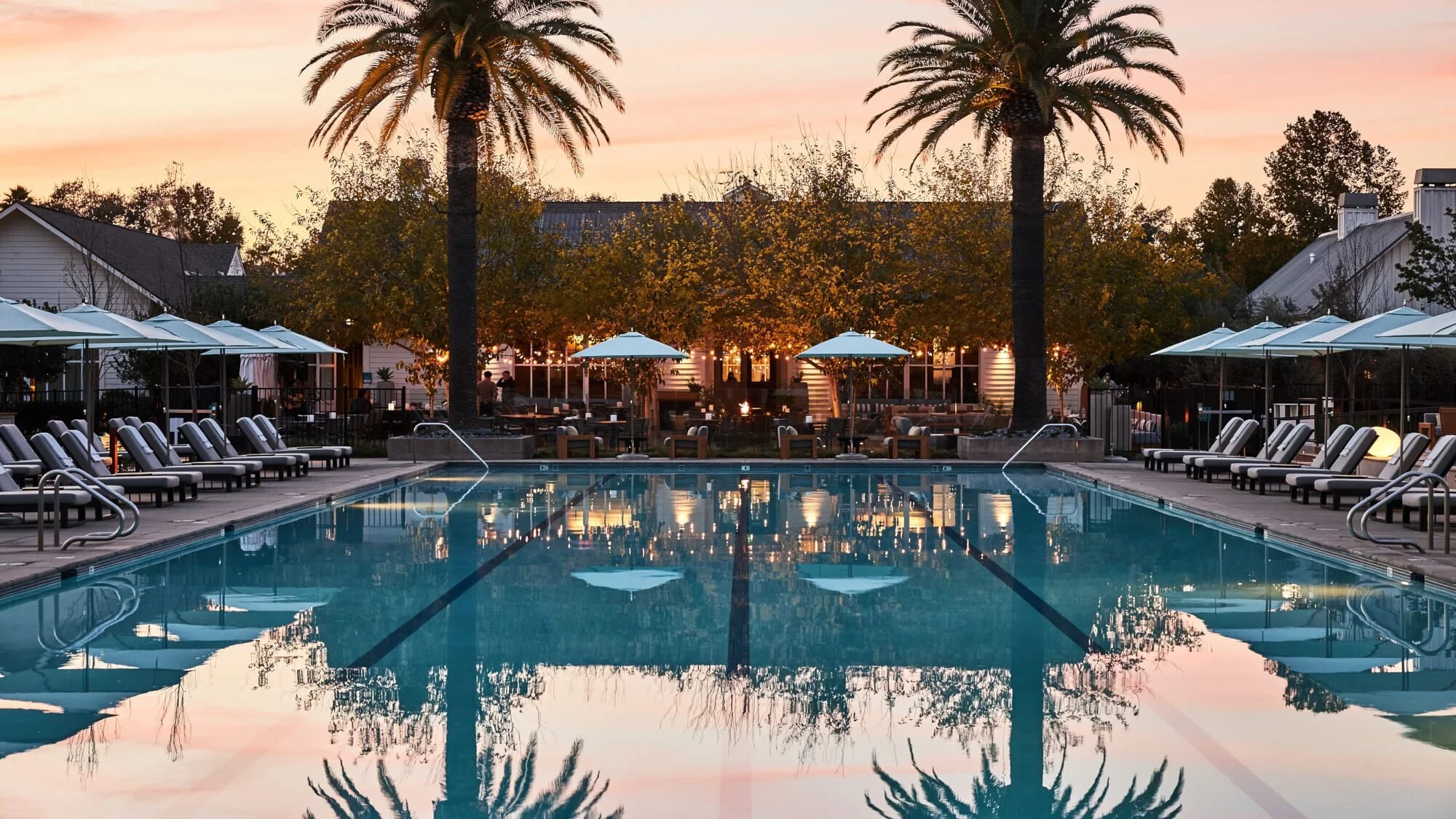 39-The-main-pool-illuminated-at-dusk.jpg