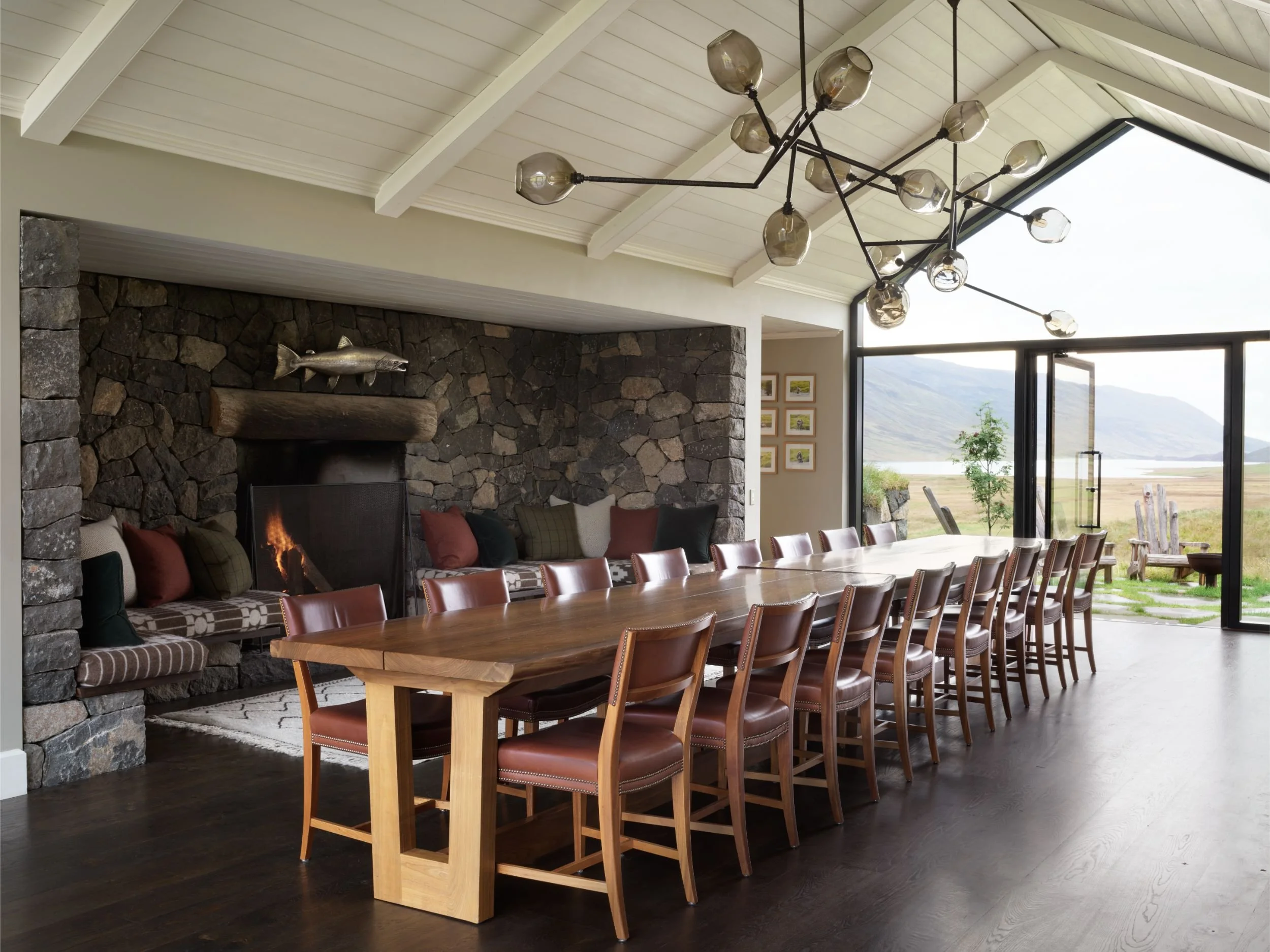 14-communal-dining-table-beside-panoramic-windows.jpg