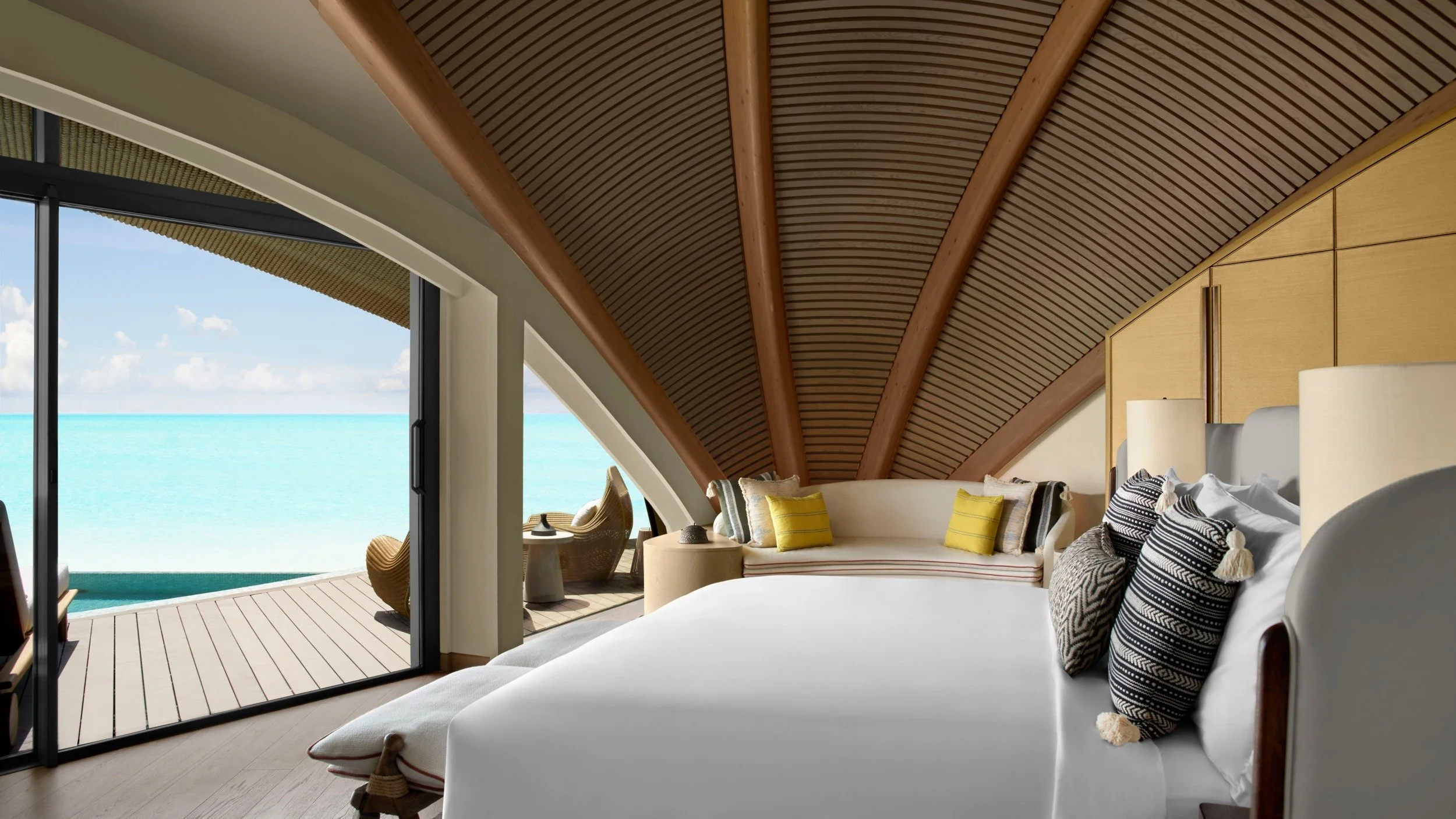 09-two-bedroom-overwater-villa-master-bedroom-overlooking-the-sea.jpg
