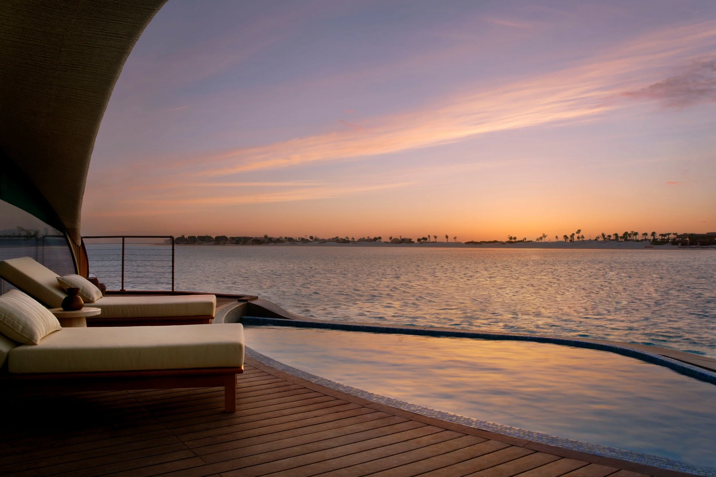 40-sunset-from-an-overwater-villa-pool-deck.jpg