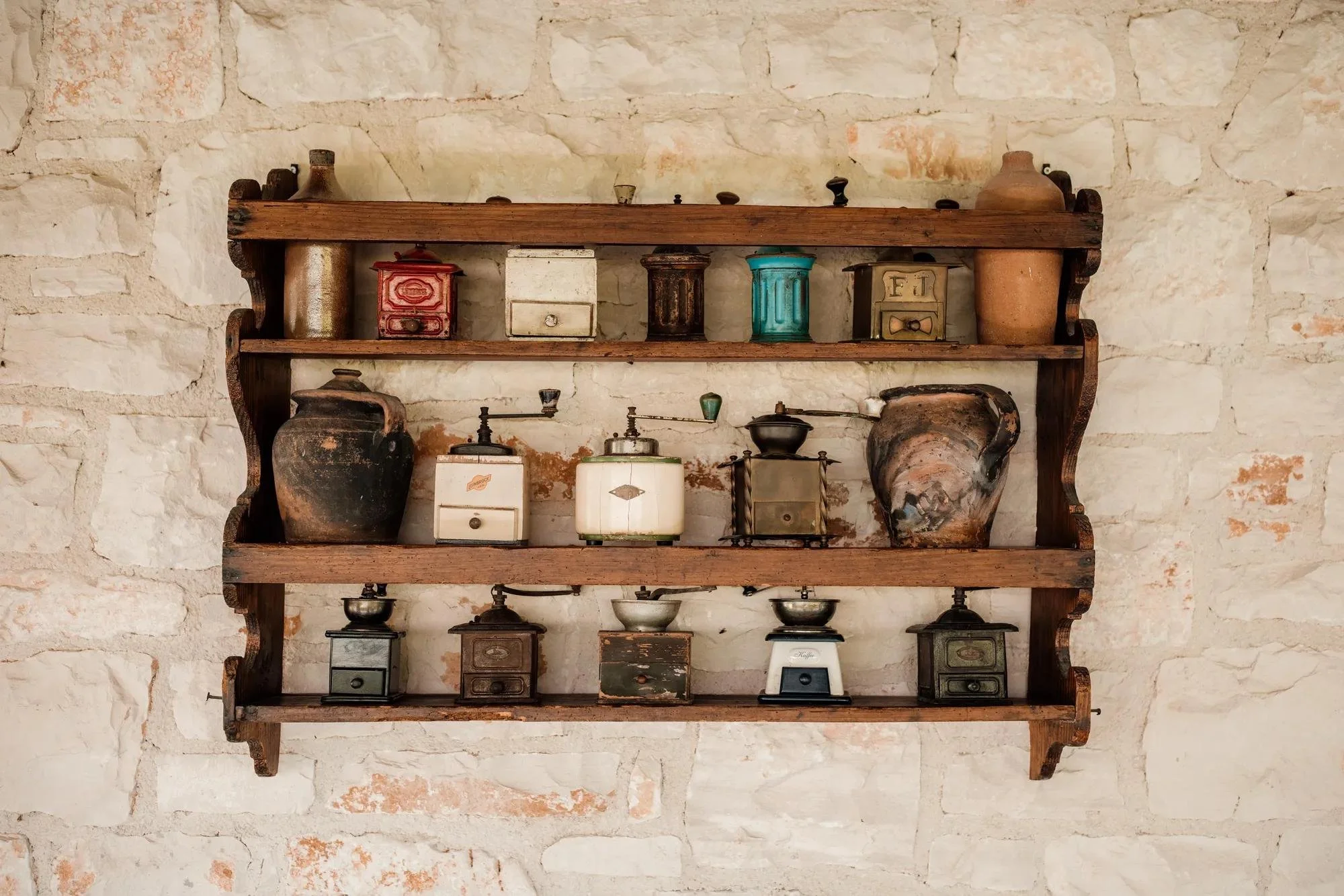 04-vintage-objects-displayed-against-an-interior-stone-wall.jpg