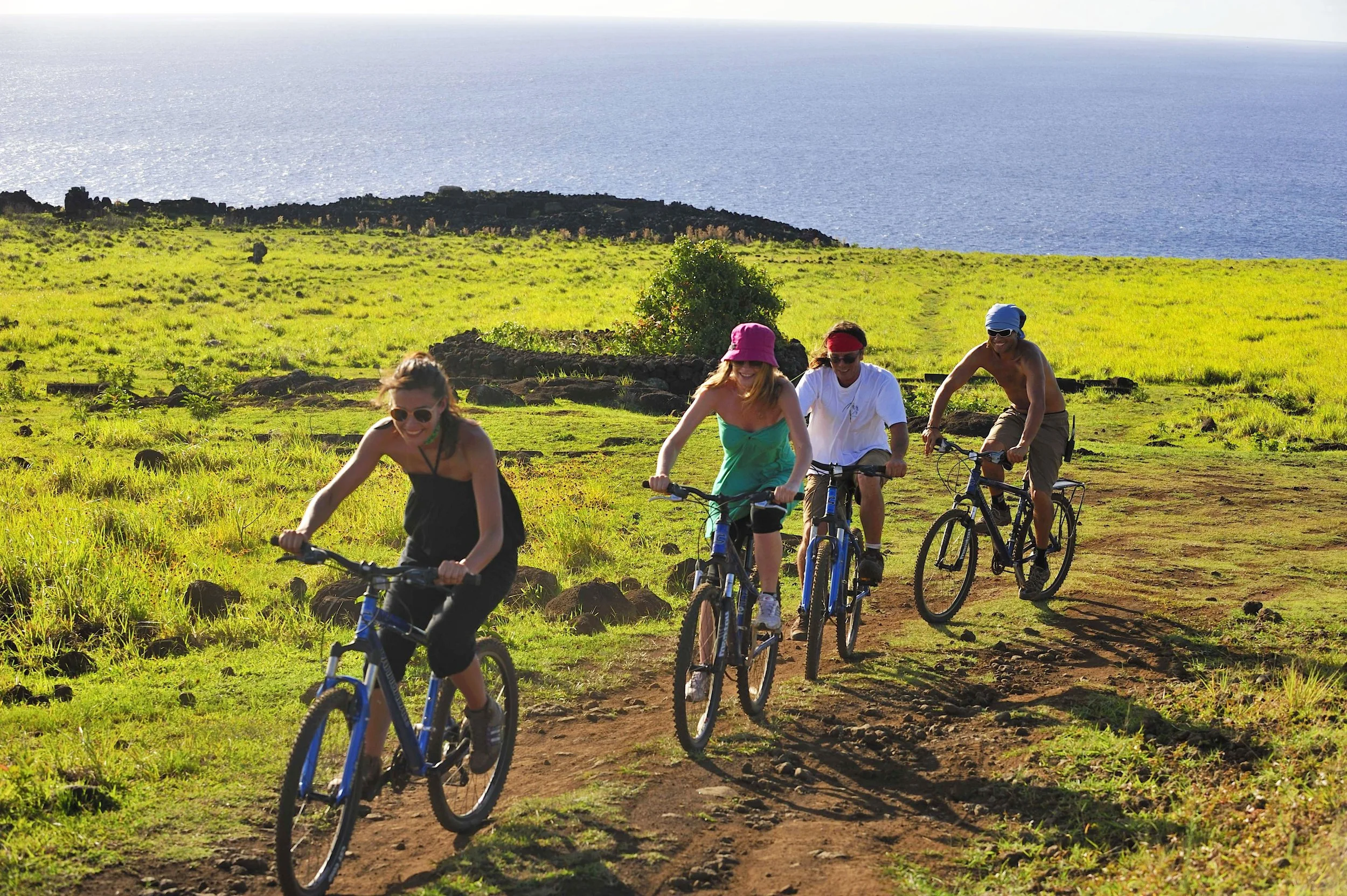 02-family-cycling-across-rapa-nui-grassland.jpg