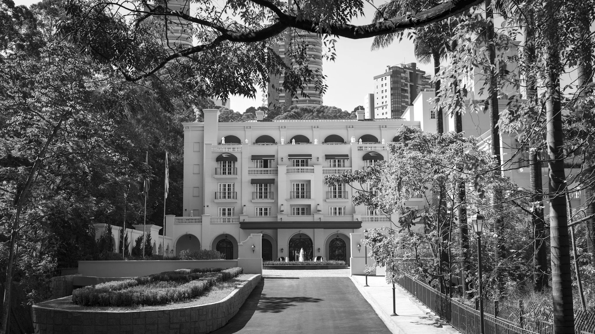 04-the-hotel-through-the-trees-in-black-and-white.jpg