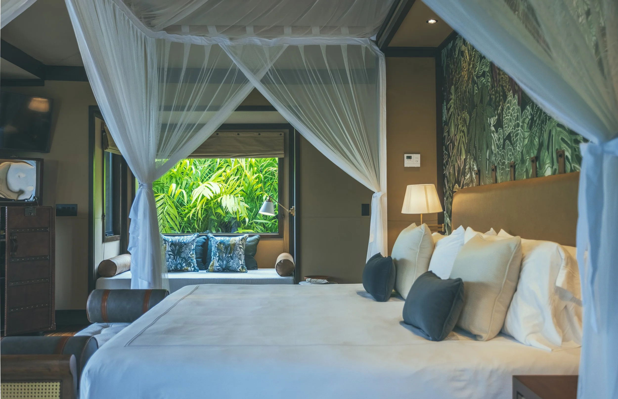 08-canopy-bed-and-botanical-interior.jpg