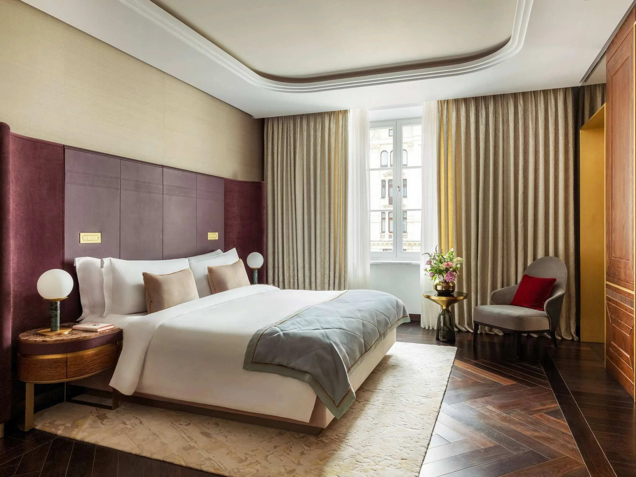 16-Raffles-Royal-Suite-Bedroom.jpg