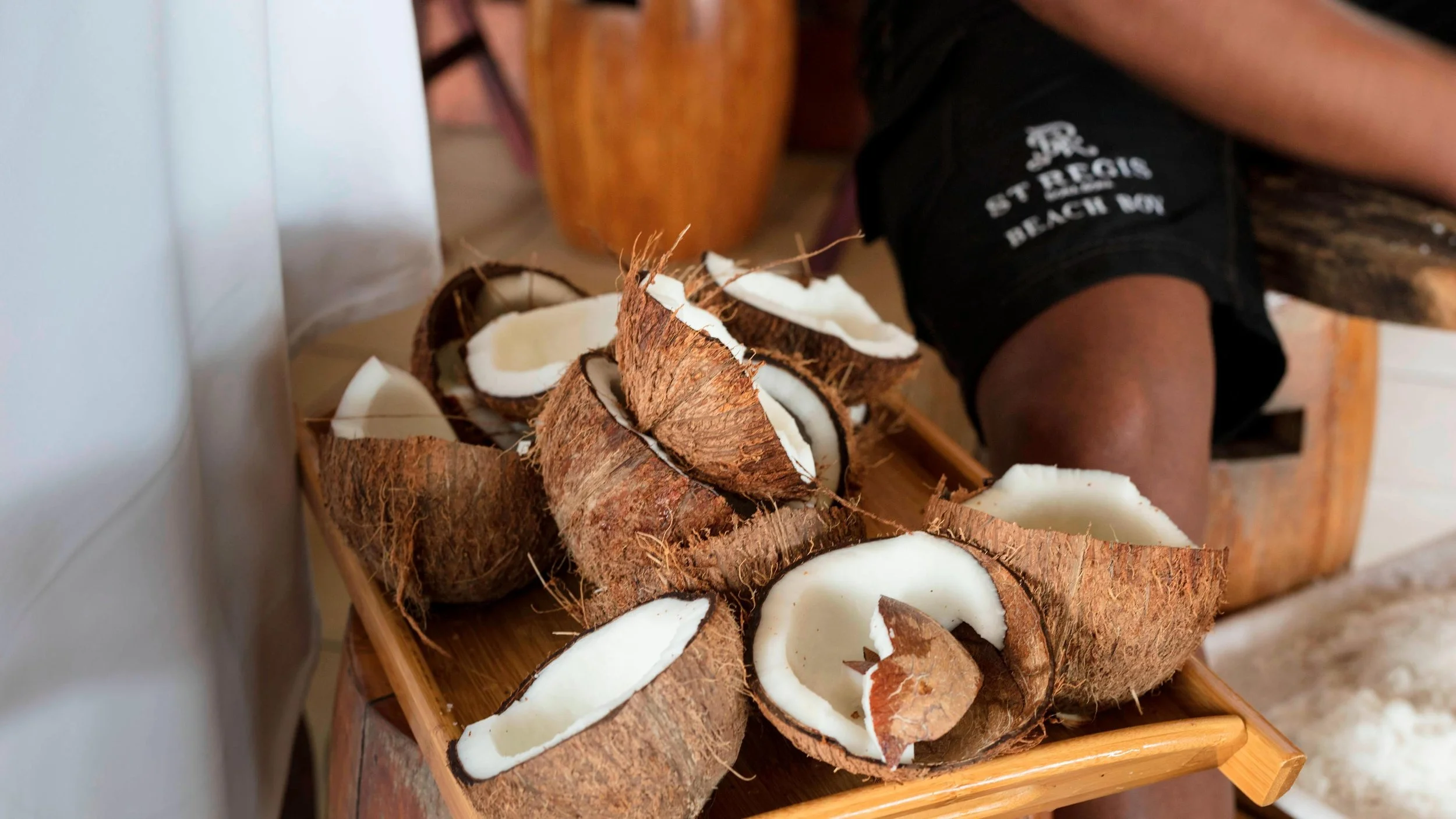 29-St-Regis-Bora-Bora-Polynesian-Coconut-Activity.jpg