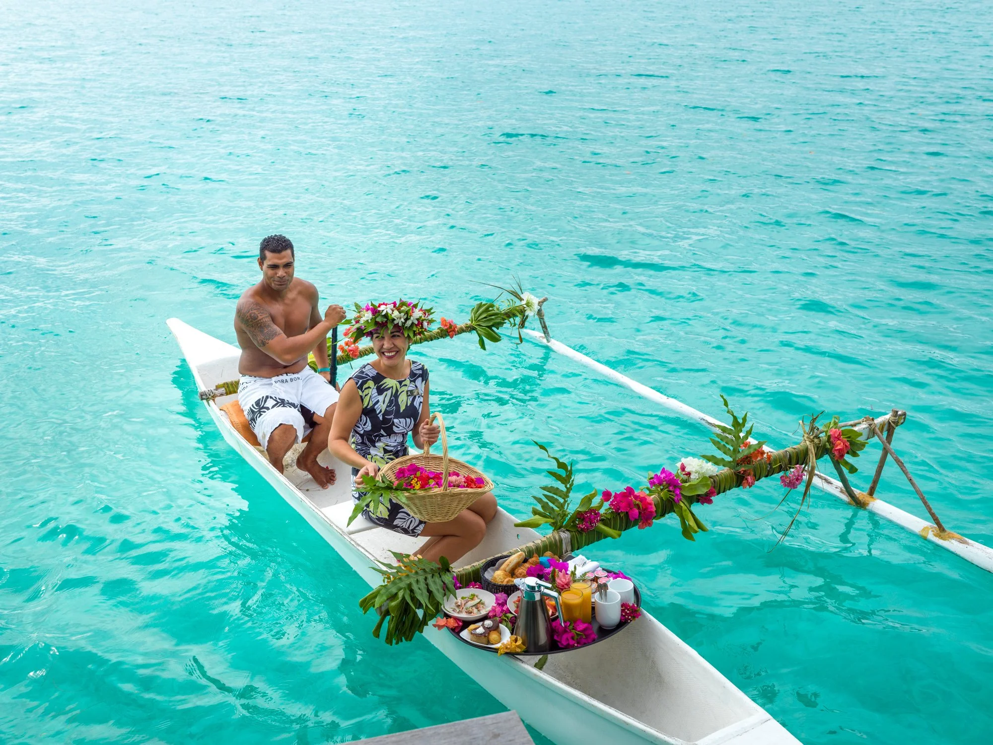 30-St-Regis-Bora-Bora-Traditional-Canoe-Breakfast-Delivery.jpg