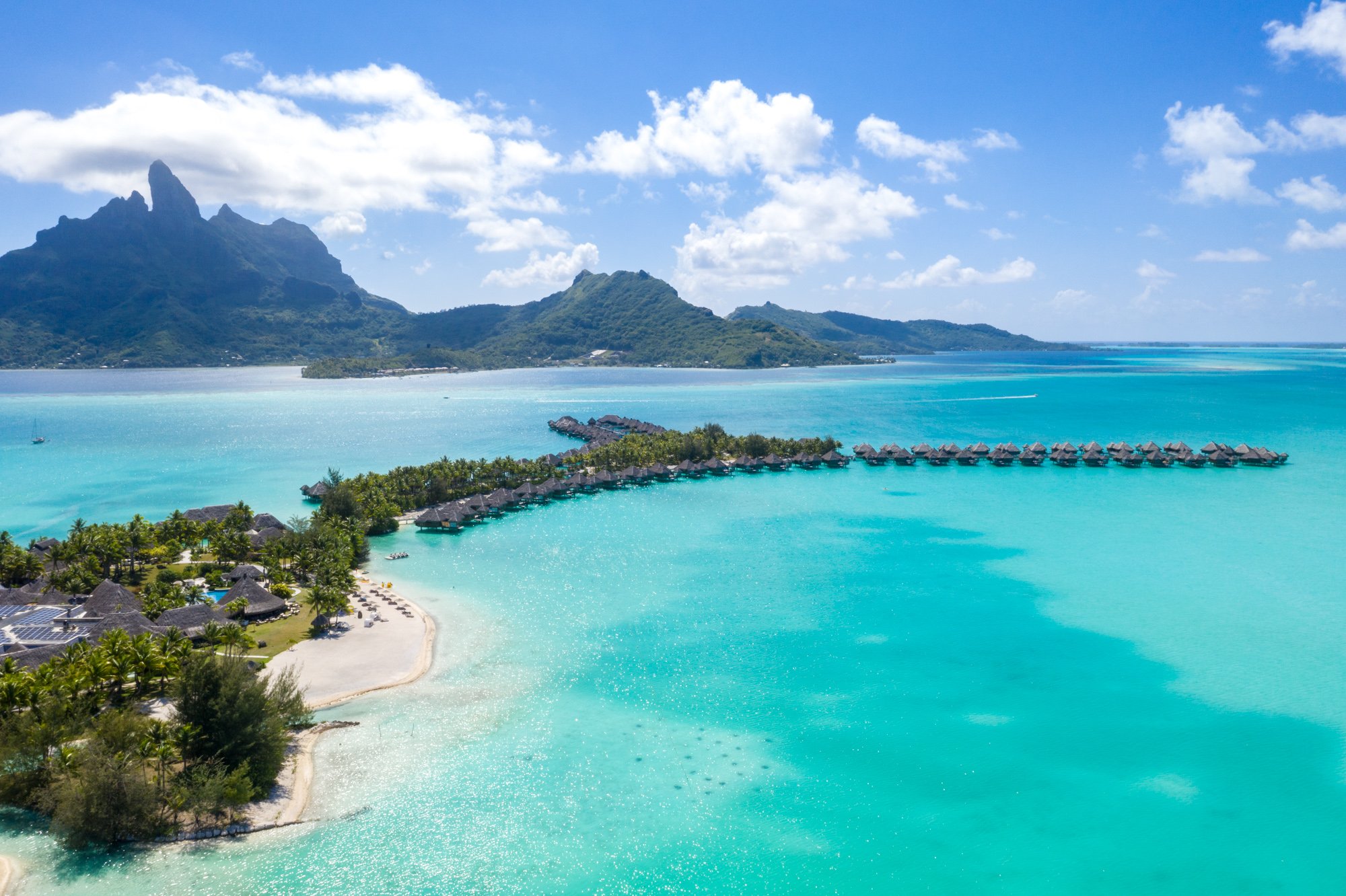 39-St-Regis-Bora-Bora-Resort-Lagoon-Aerial-in-Changing-Light.jpg