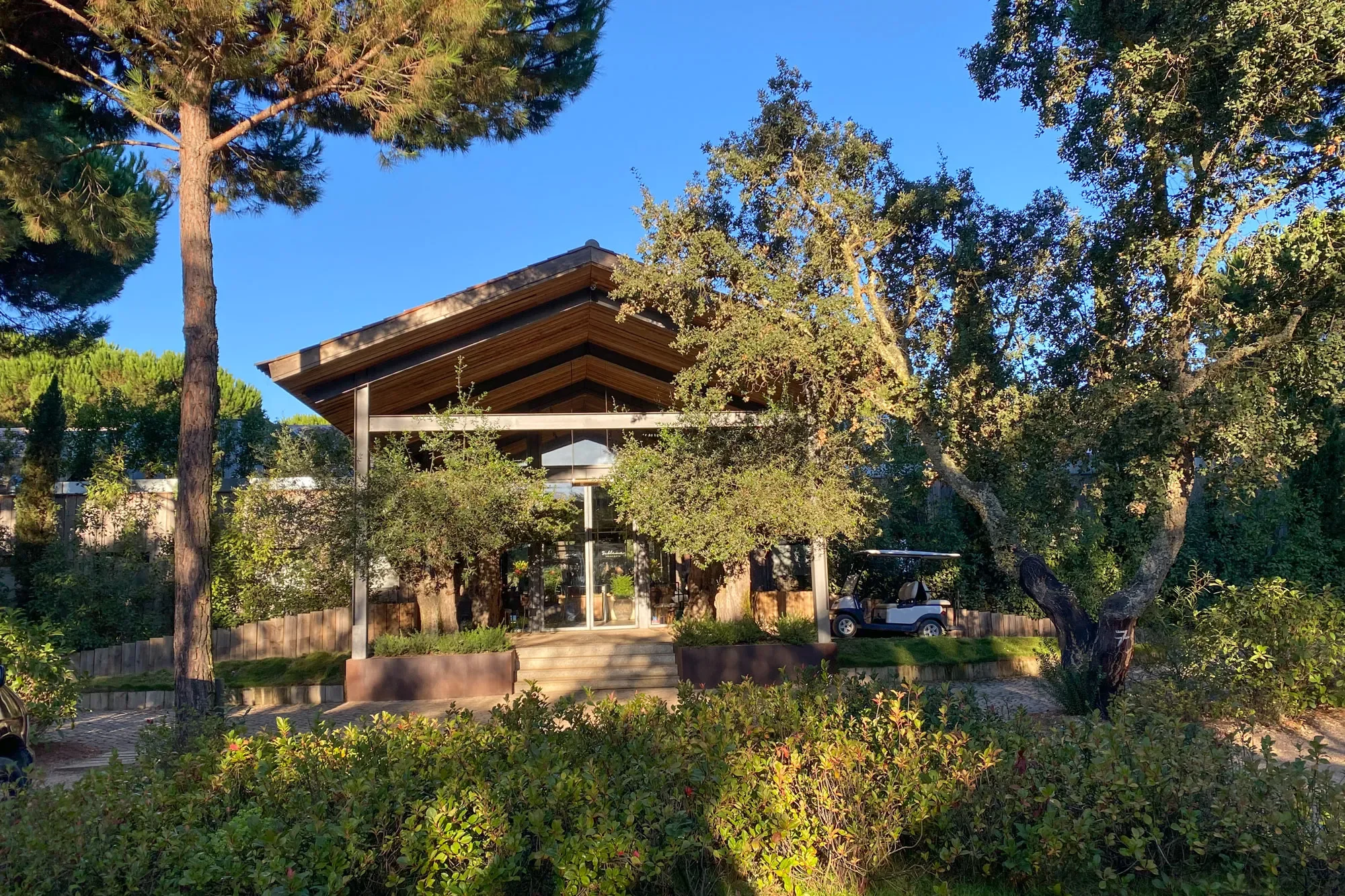 02-Terracotta-Timber-Architecture-in-the-Gardens.webp
