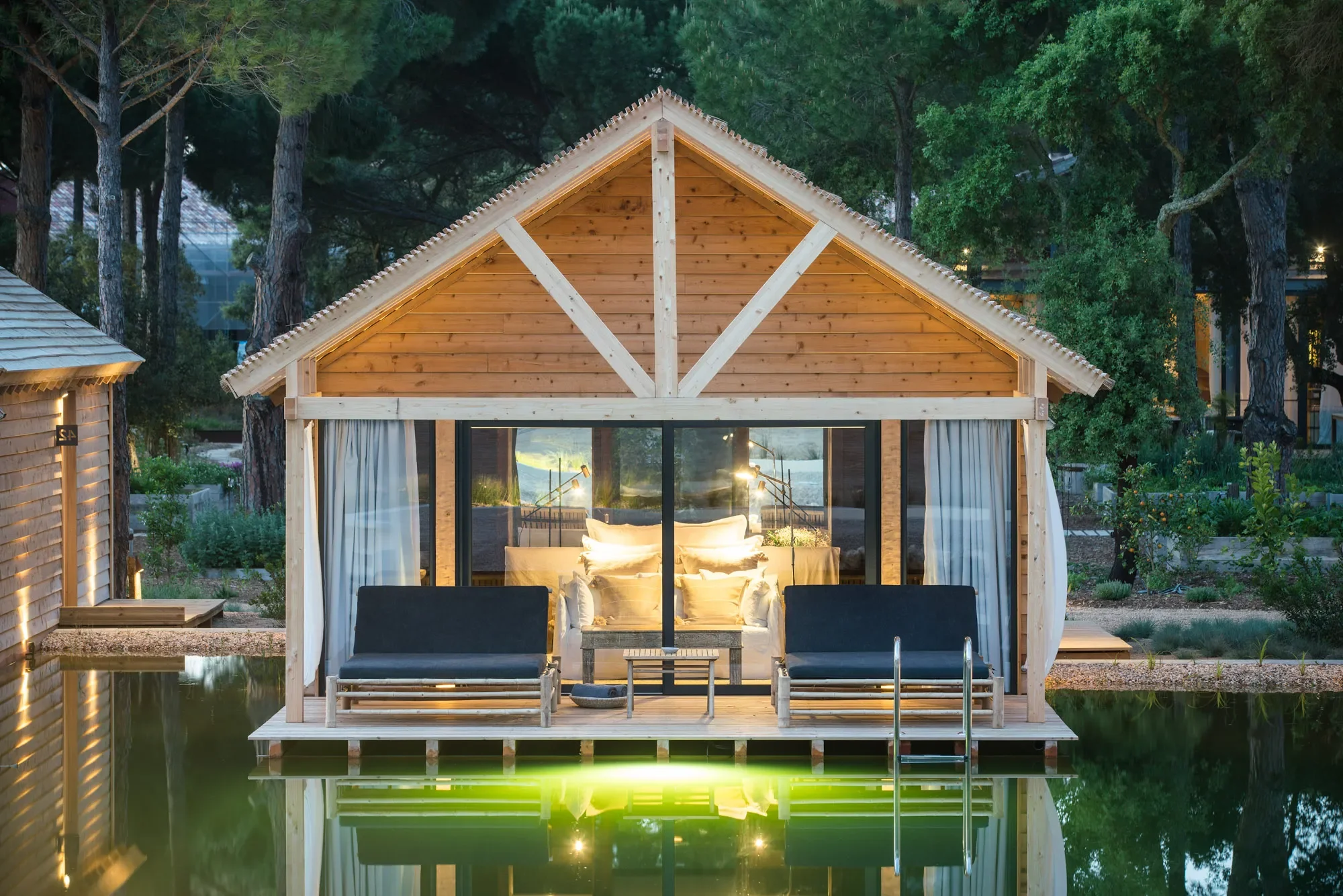 11-Terracotta-Bio-Pool-Cabana-at-Dusk.webp