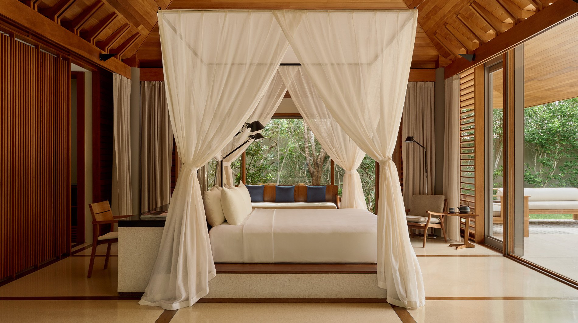 amanyara-deluxe-pool-pavillion-bed.jpg