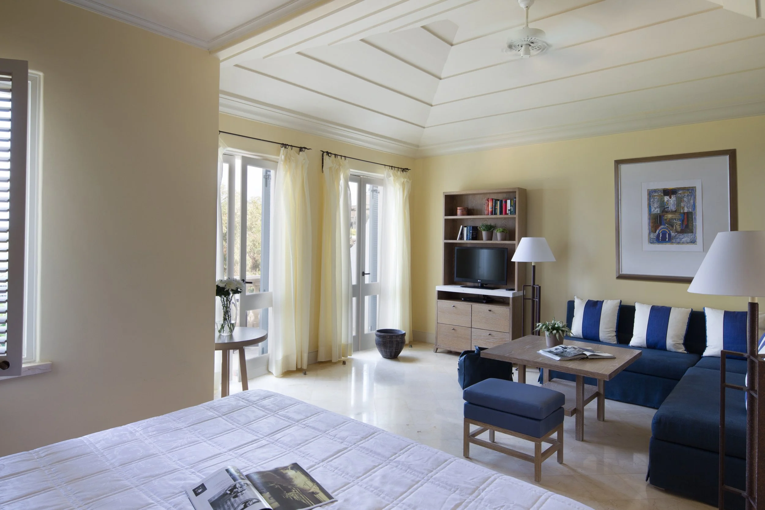 04-Anassa-Junior-Suite-Bedroom-Pre-2026.jpg