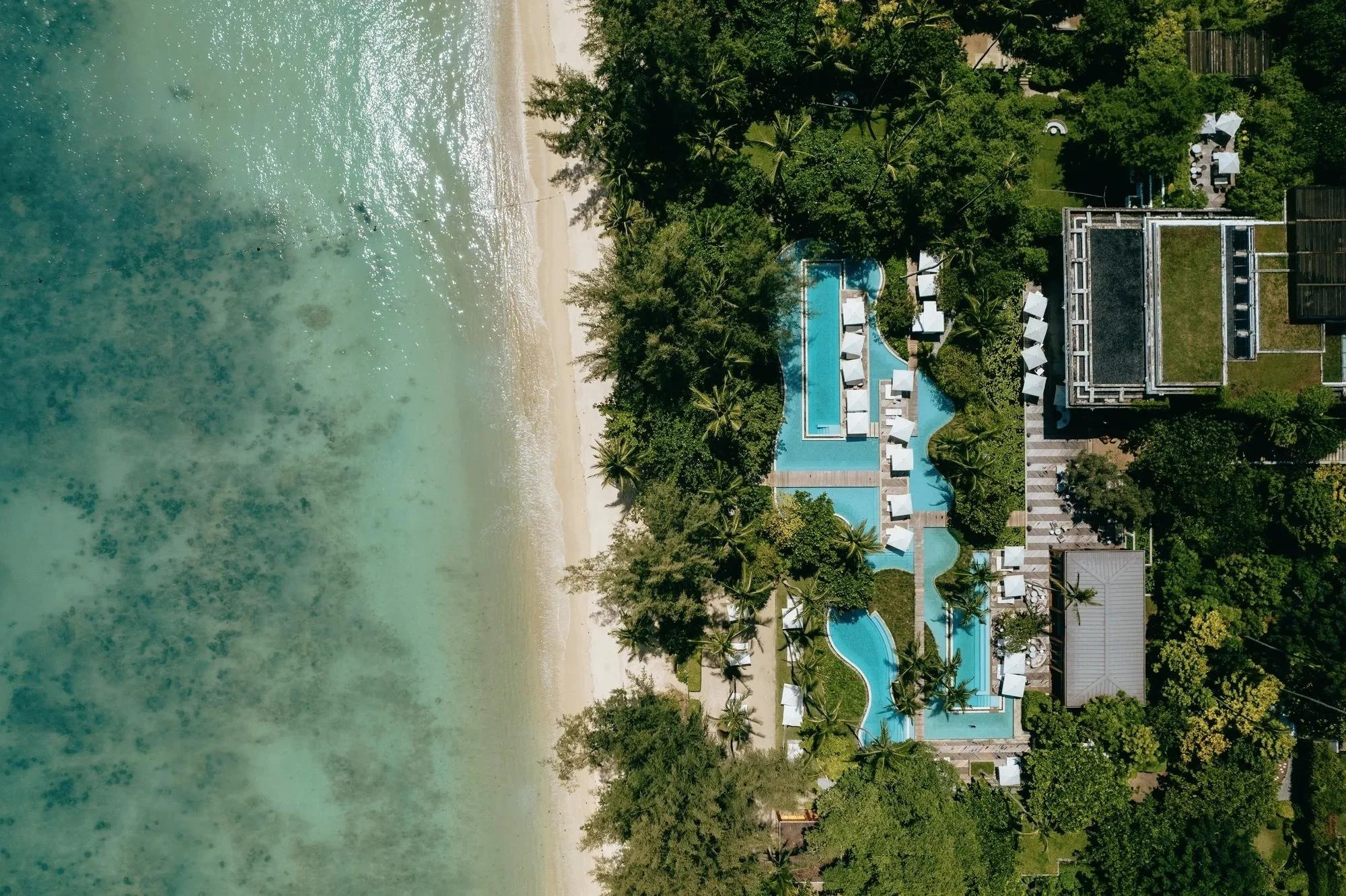 131-Emerald-Bay-and-Resort-Pool-Aerial.jpg