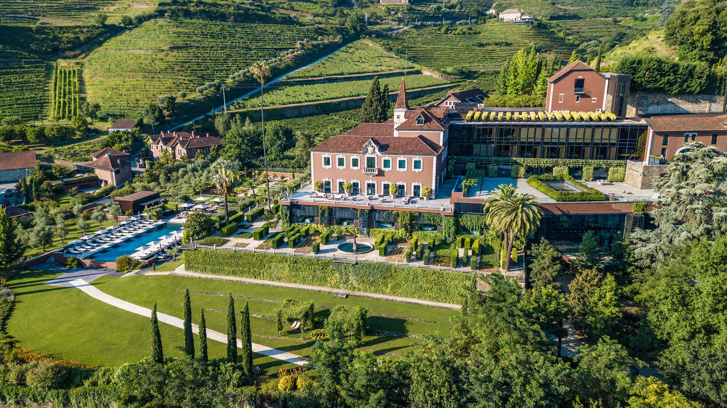 12-Six-Senses-Douro-Valley-Estate-Facade-and-Gardens-Aerial.jpg