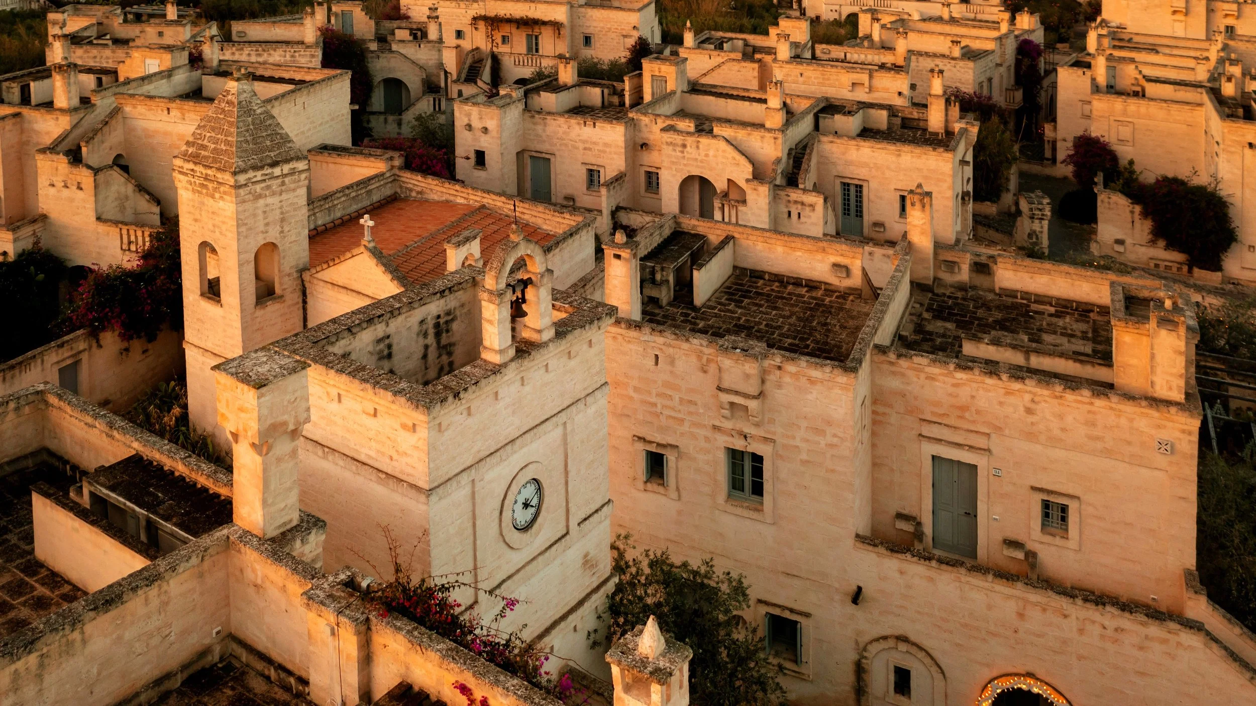 03-Borgo-Egnazia-Clock-Tower-and-Stone-Rooftops.jpg