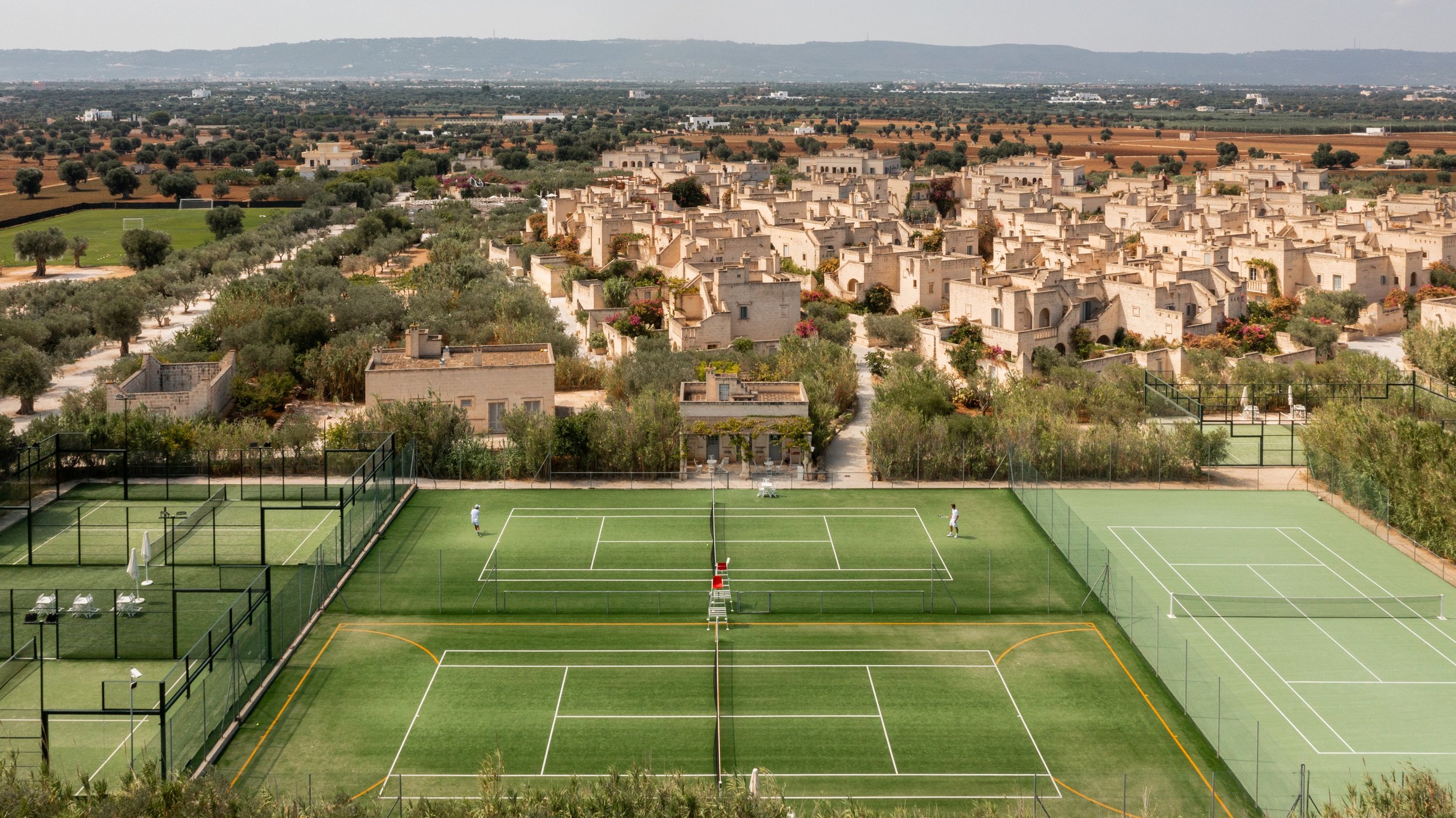 07-Borgo-Egnazia-Tennis-Courts-and-Borgo-Aerial.jpg