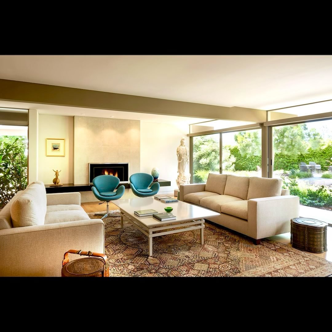 The homeowners preferred neutral warm tones (dare I say tan?) throughout this mid-century home. Why, you ask? The soft hues act as a backdrop for the lush gardens that surround the home. Plus, the fine details of their antique collection are better a
