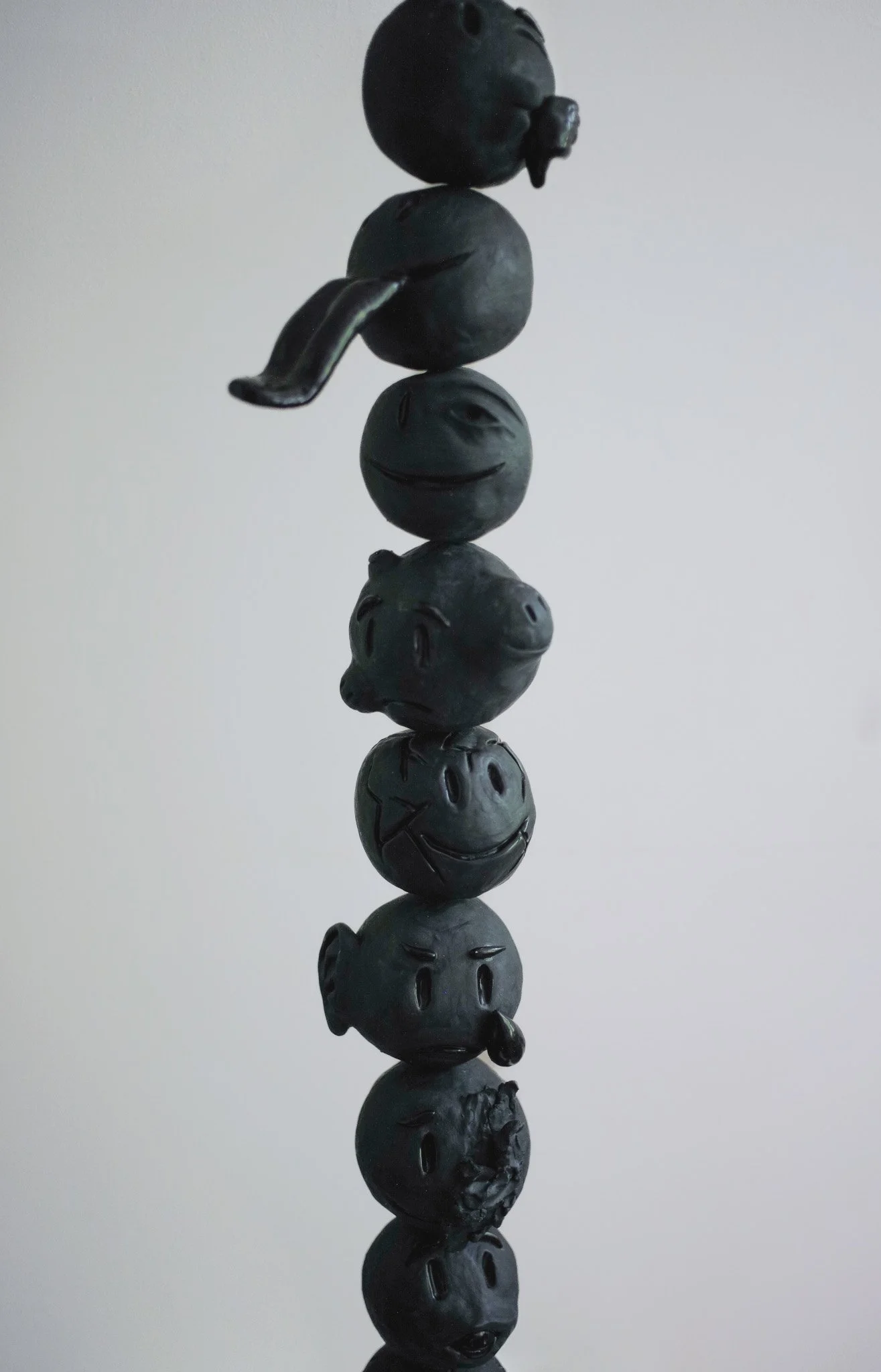 Consumed l Glazed ceramic l 59 x 16 x 16 " - 150 x 40 x 40 cm