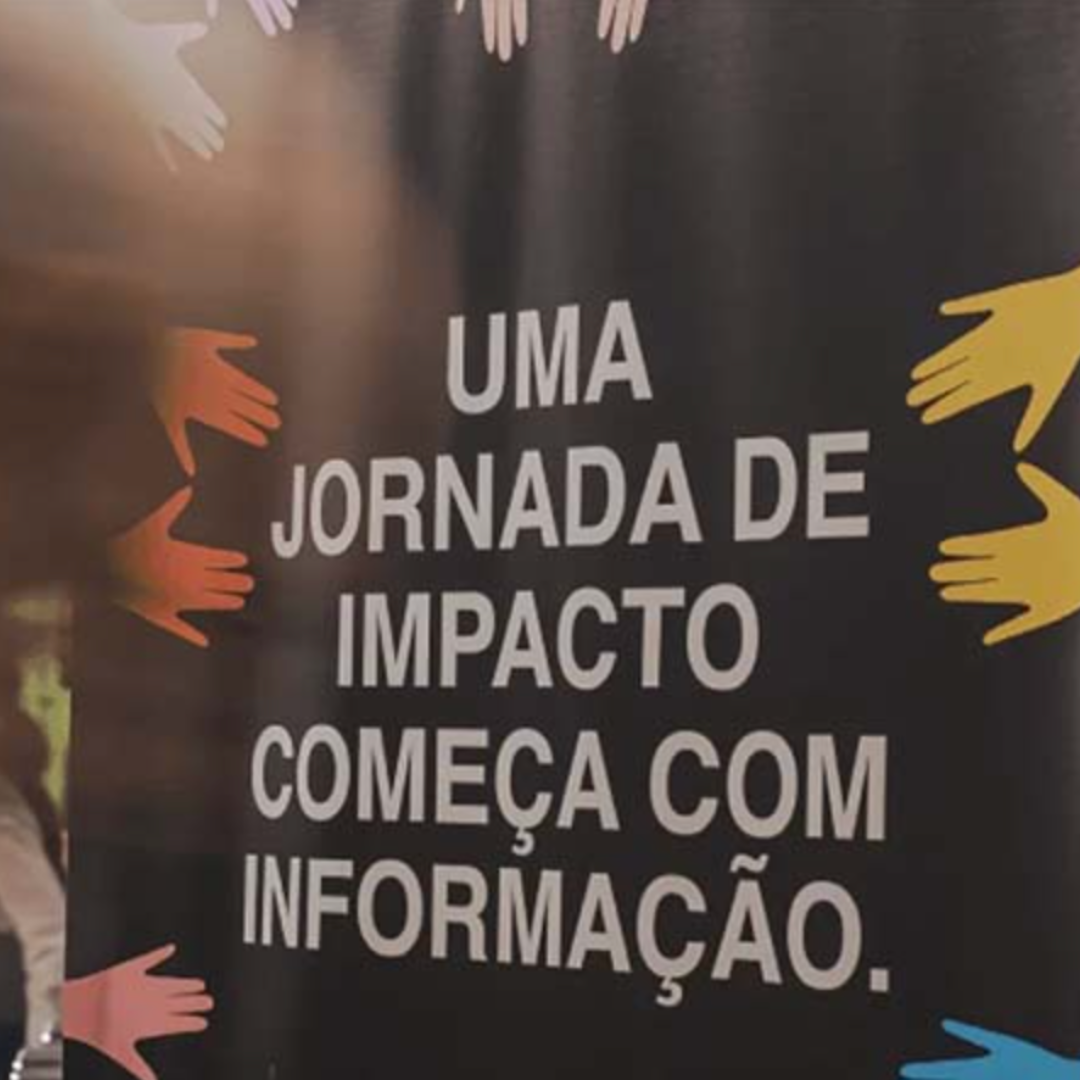 Text on a black board with graphic hands pointing towards the text