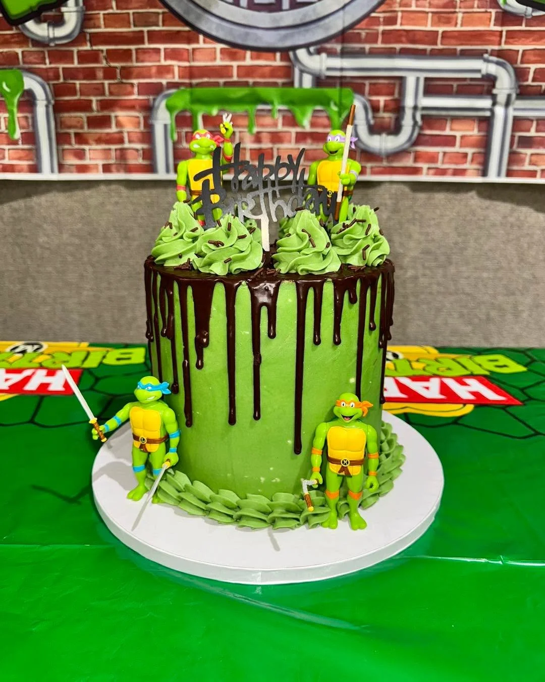 We love a good drip especially when the contrast is this good! 

This 3 year old is a chocolate fanatic, so of course we went with a dark chocolate cake, filled and coated with dark chocolate cookies and cream buttercream, and decorated with vanilla 