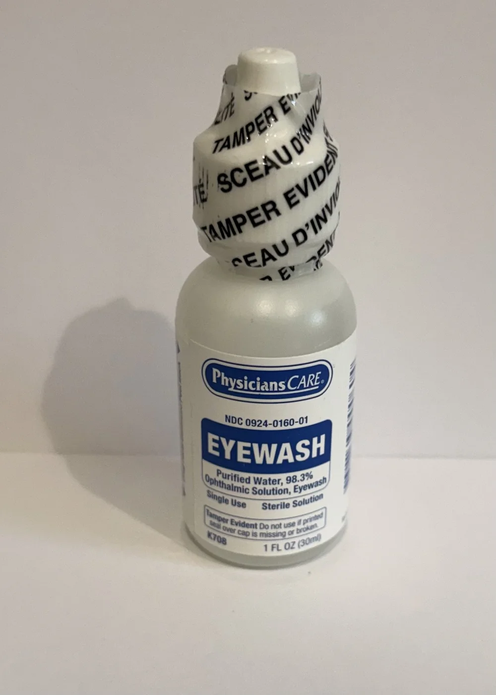 Small bottle of saline solution for slide preparation