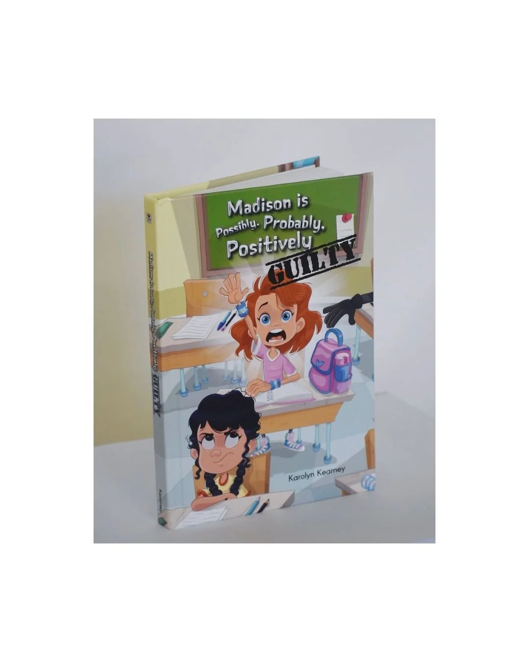 Product photo of the children’s book Madison is Possibly, Probably, Positively Guilty by Karolyn Kearney on a clean background