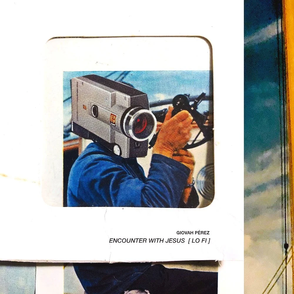 An album cover for GIOVAH PÉREZ's "ENCOUNTER WITH JESUS [ LO FI ]" features a person wearing a jacket, holding a steering wheel, and wearing a camera as a head in front of a sky background.