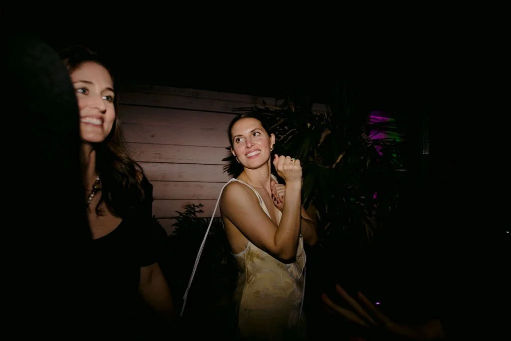 woman in a yellow dress dancing