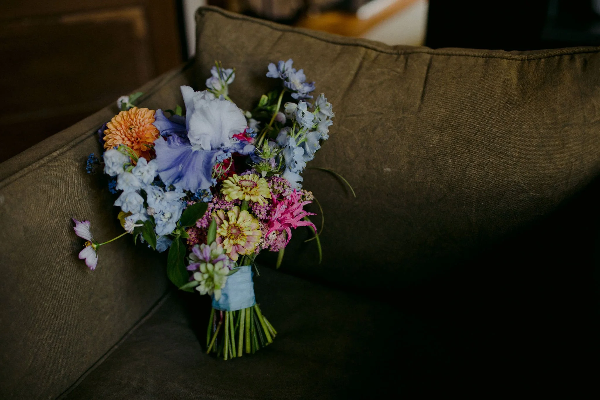 Colorful Bouquet resting on a green chair