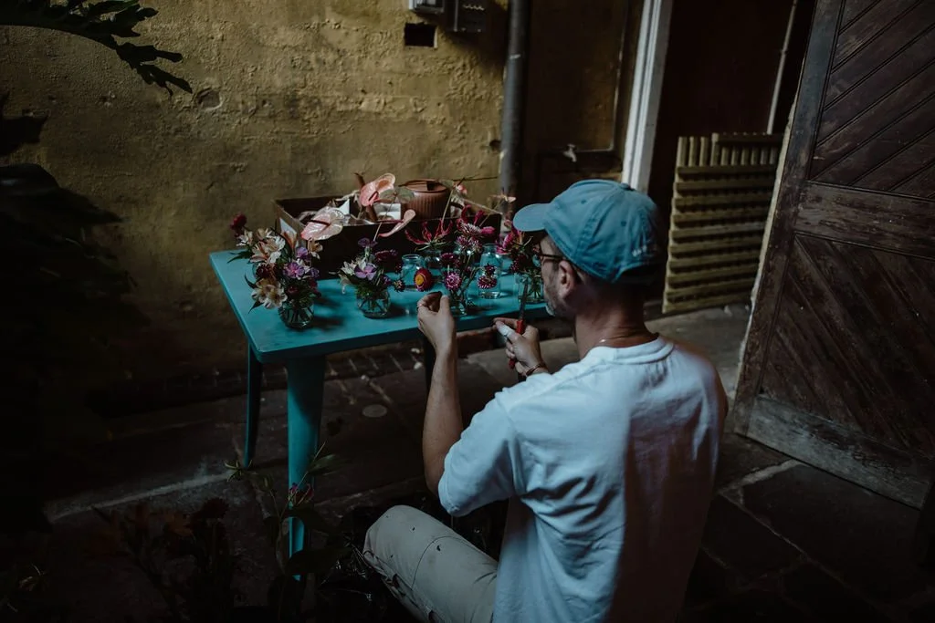 Designer creating floral vases