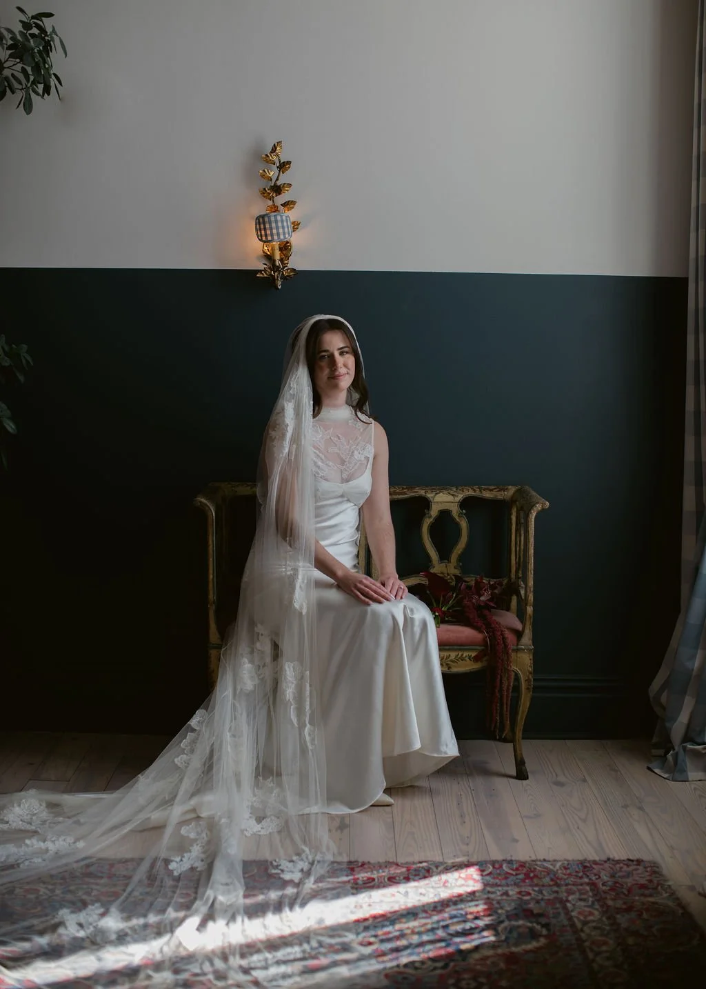 Bride sitting down at Hotel Peter and Paul New Orleans