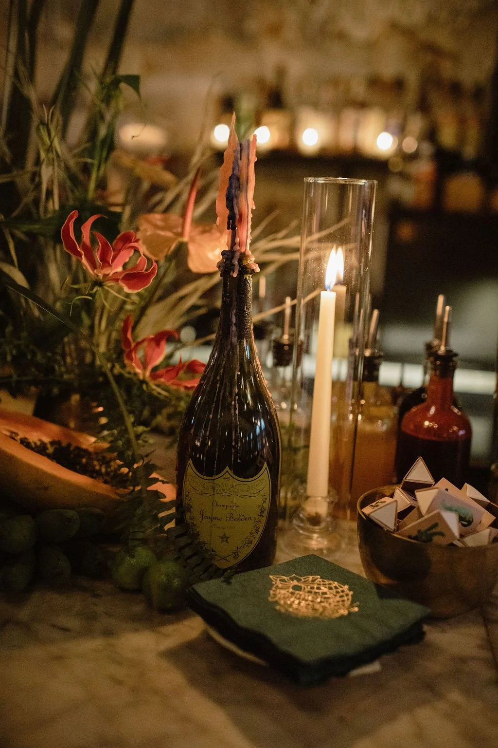 candles and fruit display on the bar