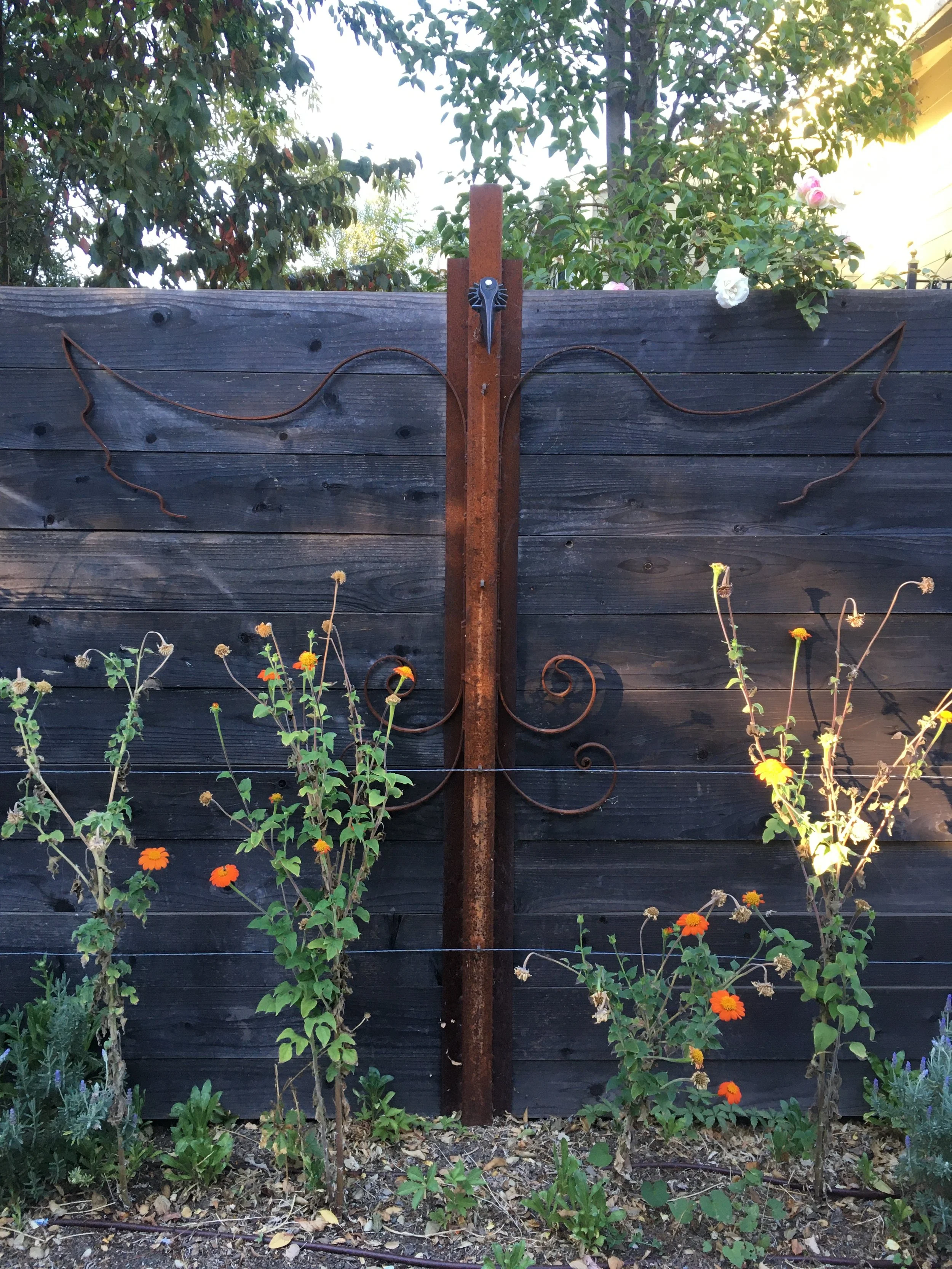 Fence with Custom Wrought Iron Posts